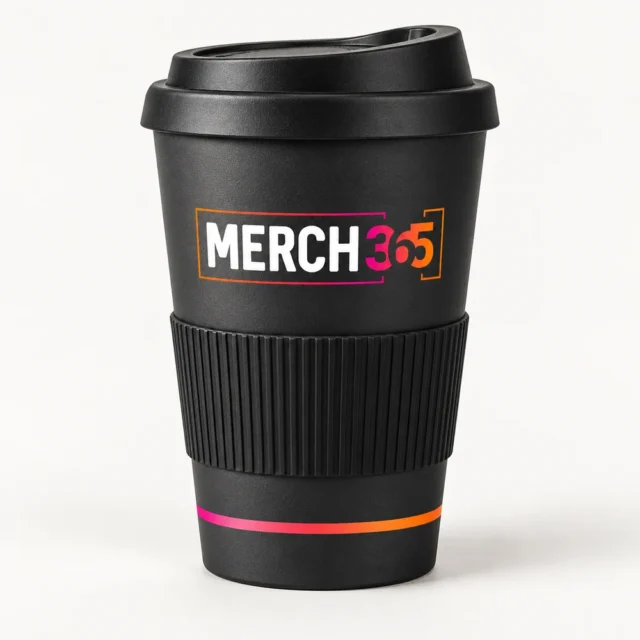 Coffee cups with Merch365 branding on a warm white studio background — concept