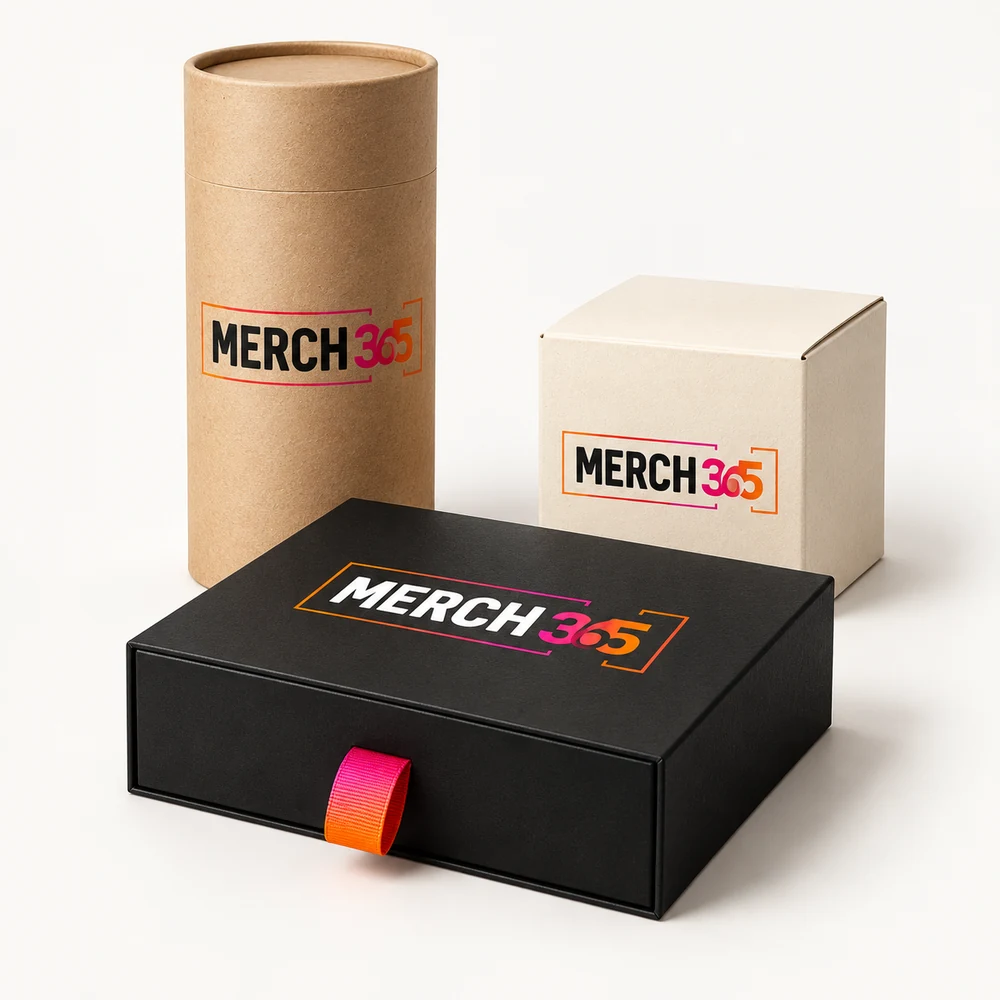 Custom packaging with Merch365 branding on a warm white studio background — concept