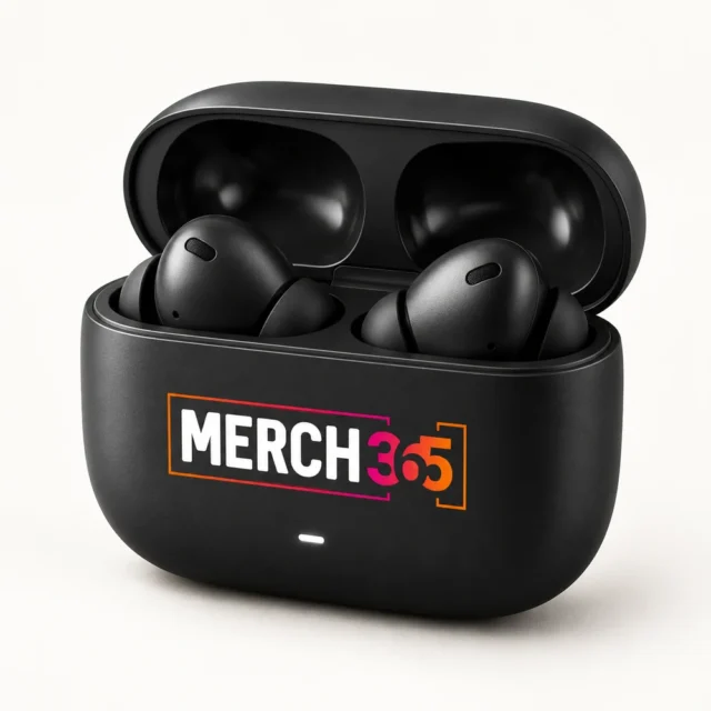Wireless earbuds with Merch365 branding on a warm white studio background — concept